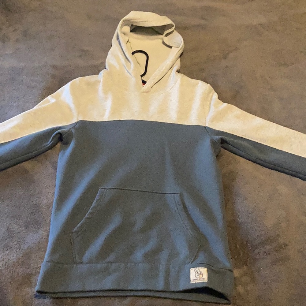 here is a hoodie, used but not in bad condition.